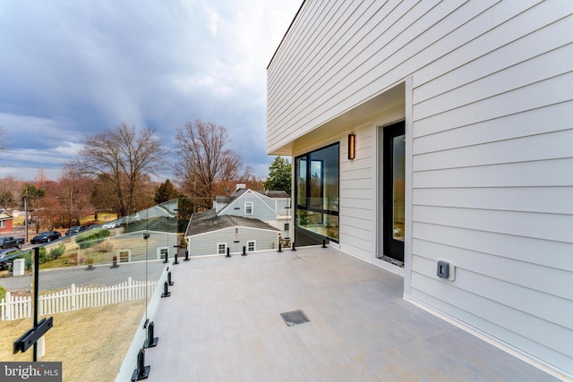 view of patio / terrace featuring fence