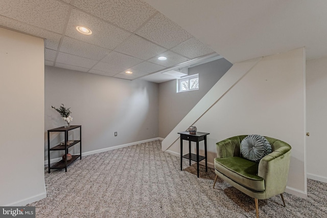 living area with carpet, a paneled ceiling, baseboards, and recessed lighting