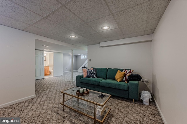 living room with baseboards, a drop ceiling, stairway, carpet flooring, and recessed lighting