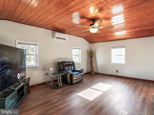 sitting room featuring lofted ceiling, a healthy amount of sunlight, and wood finished floors