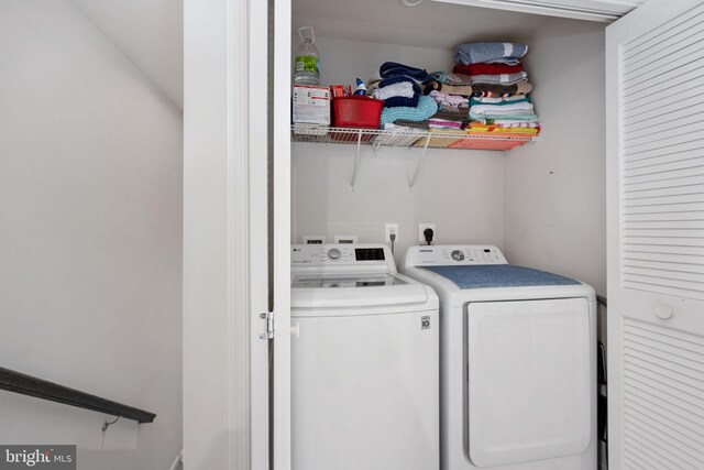 laundry room featuring laundry area and washing machine and dryer