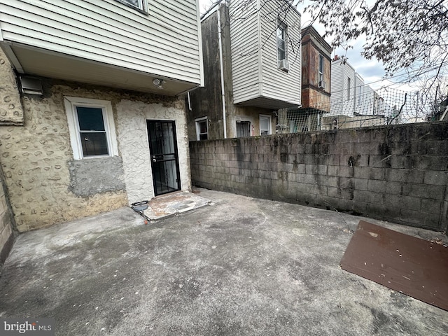 view of patio with fence