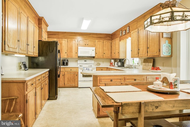 kitchen featuring brown cabinetry, white appliances, light countertops, and a sink