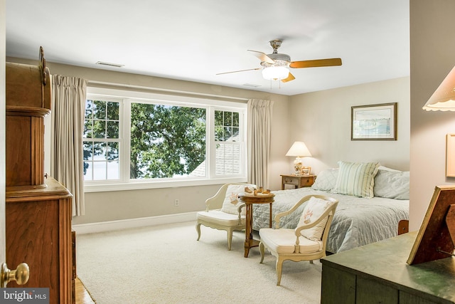 bedroom with visible vents, carpet floors, a ceiling fan, and baseboards