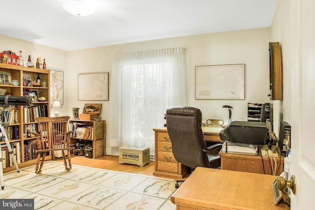 home office featuring light wood finished floors