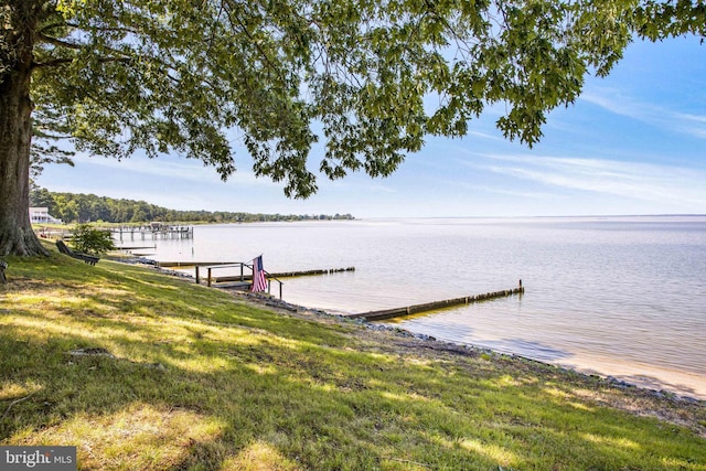 view of dock with a water view