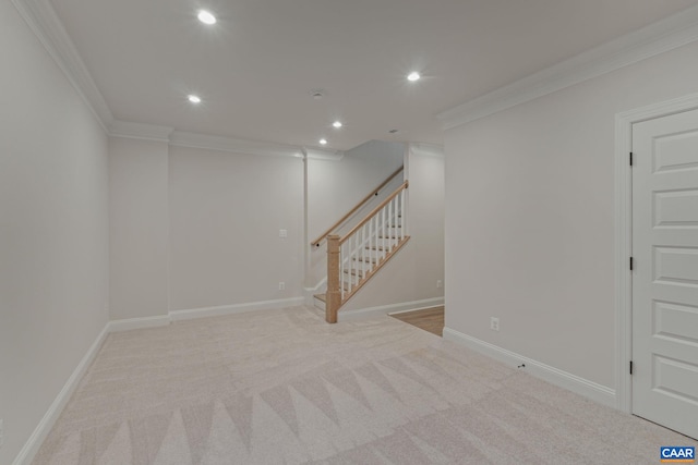 unfurnished room featuring recessed lighting, stairway, light colored carpet, and ornamental molding