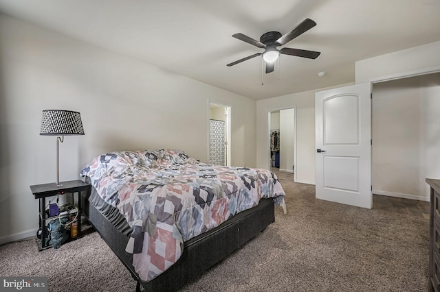 carpeted bedroom featuring ceiling fan and baseboards