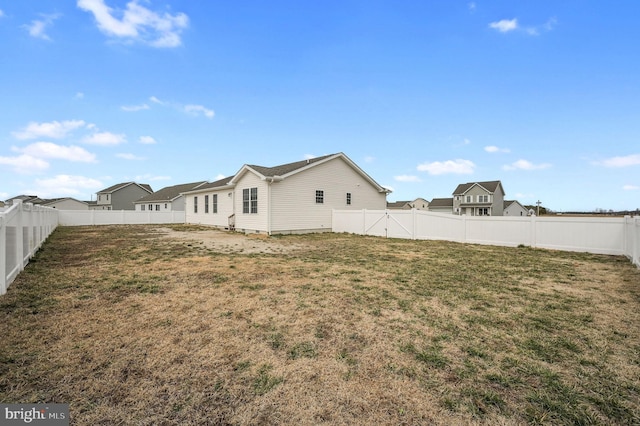 exterior space featuring a fenced backyard