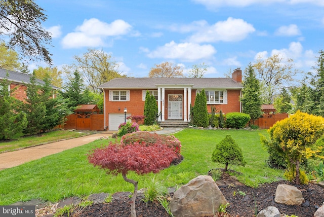 5924 Kimble Ct, Falls Church, VA 22041 - view of front facade featuring brick siding, fence, driveway, and a chimney