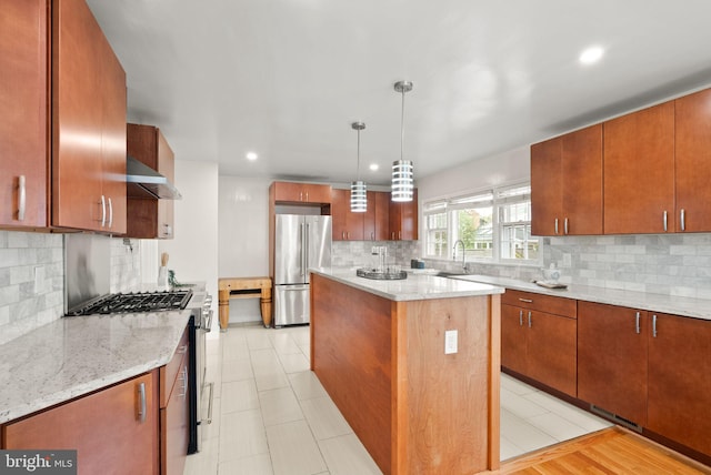5924 Kimble Ct, Falls Church, VA 22041 - kitchen featuring a kitchen island, wall chimney exhaust hood, decorative backsplash, stainless steel appliances, and a sink