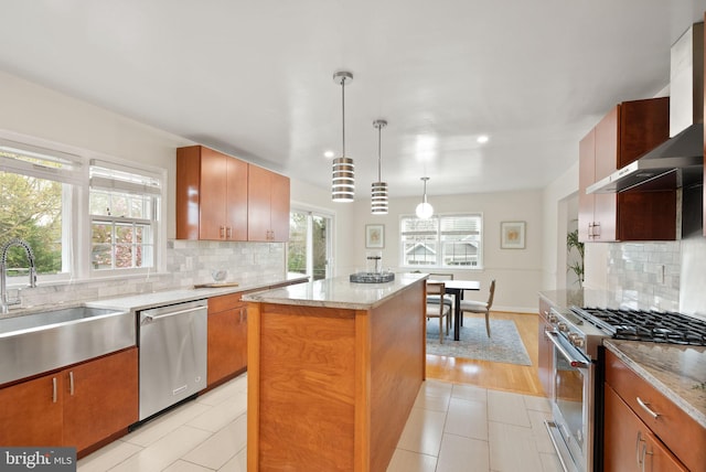 5924 Kimble Ct, Falls Church, VA 22041 - kitchen featuring tasteful backsplash, a sink, wall chimney range hood, appliances with stainless steel finishes, and a kitchen island