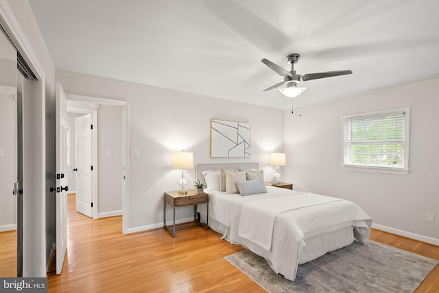 5924 Kimble Ct, Falls Church, VA 22041 - bedroom featuring light wood-style floors, a closet, ceiling fan, and baseboards