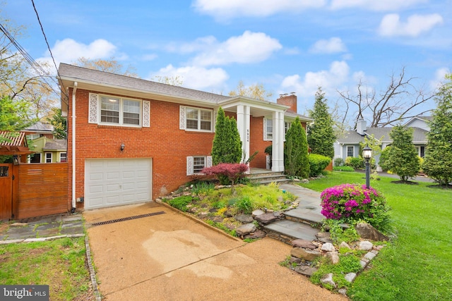 5924 Kimble Ct, Falls Church, VA 22041 - view of front facade with brick siding, a front lawn, an attached garage, and concrete driveway
