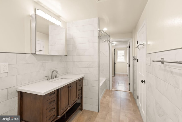 5924 Kimble Ct, Falls Church, VA 22041 - full bath featuring tile patterned floors, vanity, tile walls, and shower / bathing tub combination