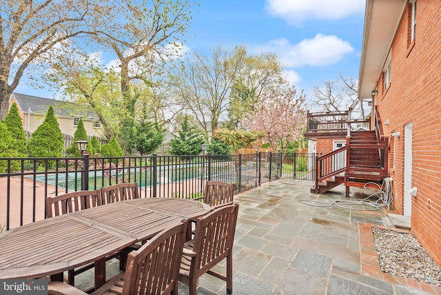 5924 Kimble Ct, Falls Church, VA 22041 - view of patio / terrace featuring a fenced in pool, stairs, outdoor dining area, and fence