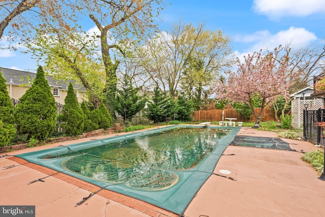 5924 Kimble Ct, Falls Church, VA 22041 - view of swimming pool featuring a fenced in pool, a patio, a fenced backyard, and a diving board