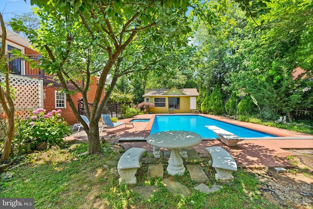 5924 Kimble Ct, Falls Church, VA 22041 - view of swimming pool featuring an exterior structure, a diving board, an outdoor structure, and a patio