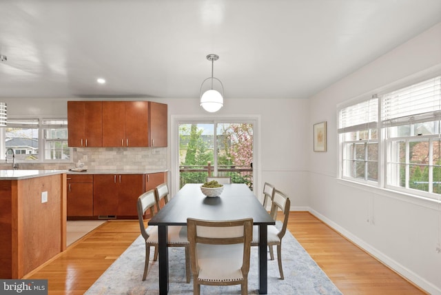 5924 Kimble Ct, Falls Church, VA 22041 - dining space with recessed lighting, plenty of natural light, light wood-style floors, and baseboards