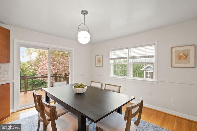 5924 Kimble Ct, Falls Church, VA 22041 - dining room featuring light wood-style flooring and baseboards