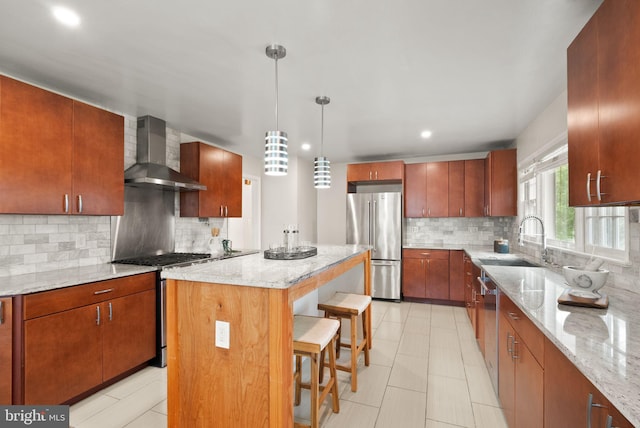 5924 Kimble Ct, Falls Church, VA 22041 - kitchen featuring wall chimney exhaust hood, a sink, a breakfast bar, stainless steel appliances, and a kitchen island
