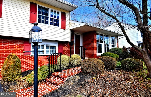 view of front of property with brick siding