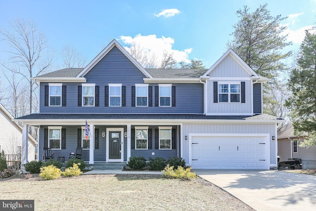 view of front of home with driveway, a porch, board and batten siding, and an attached garage