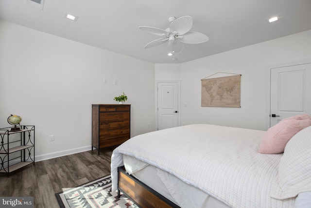 bedroom with visible vents, baseboards, ceiling fan, dark wood-type flooring, and recessed lighting