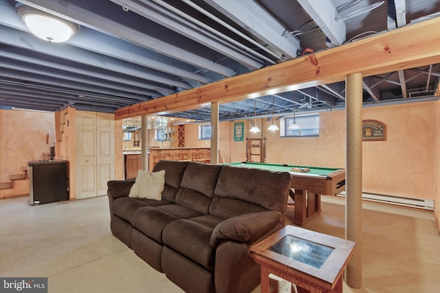 living area with baseboard heating, concrete floors, and billiards