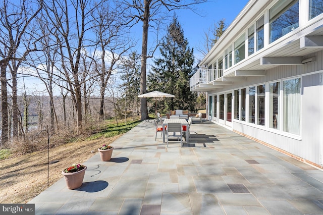 view of patio / terrace with a balcony