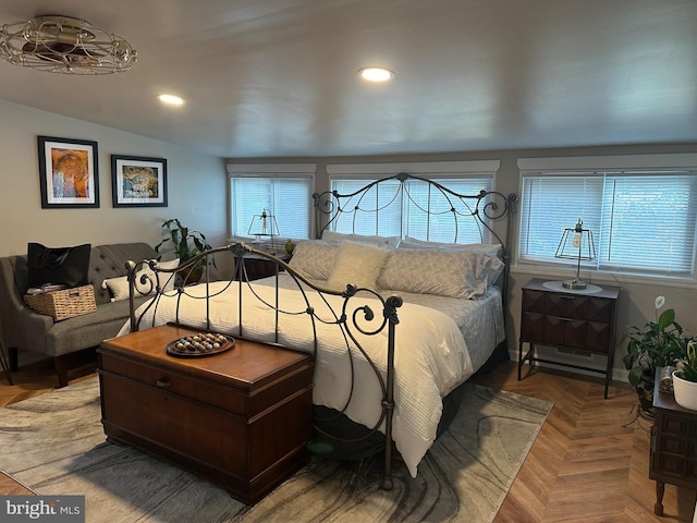 bedroom with recessed lighting, multiple windows, and lofted ceiling