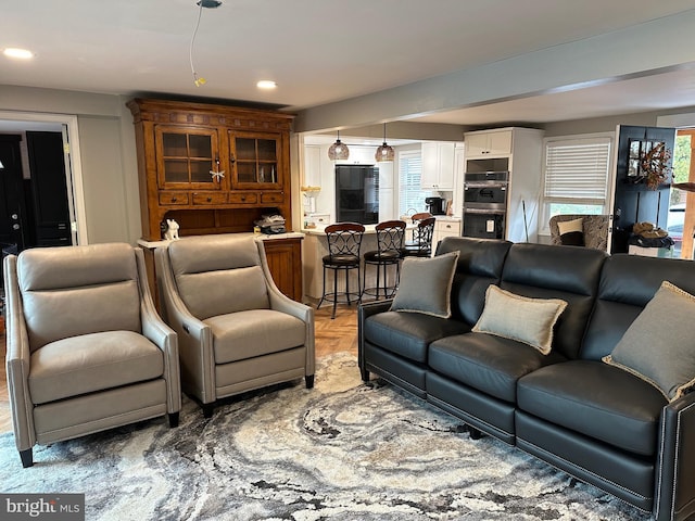 living area featuring recessed lighting