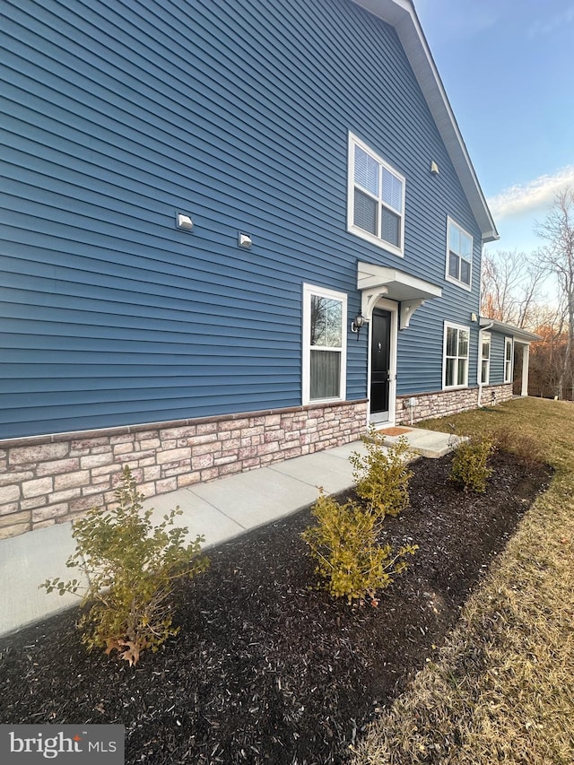 view of front of house featuring stone siding