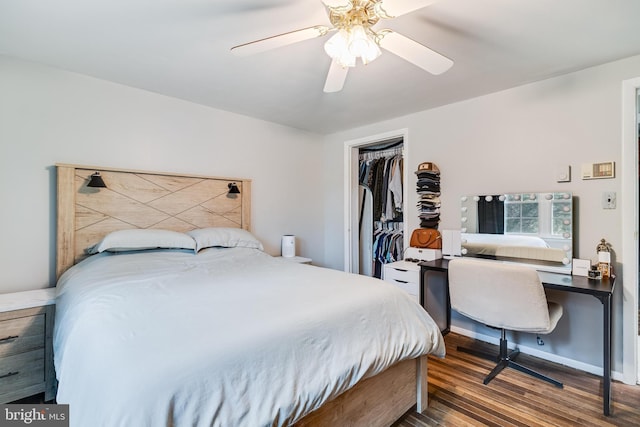 bedroom featuring ceiling fan, a closet, baseboards, and wood finished floors