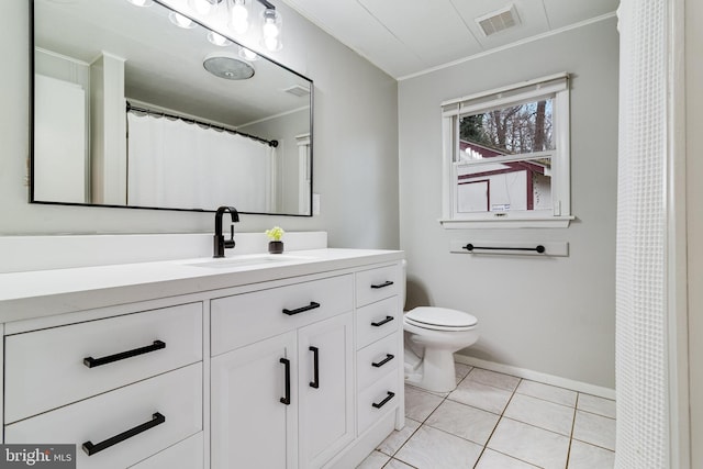 bathroom with visible vents, toilet, tile patterned flooring, crown molding, and vanity