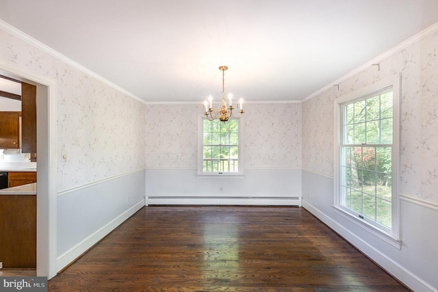 13086 Langley Rd, Bryantown, MD 20617 - unfurnished dining area featuring an inviting chandelier, crown molding, a baseboard heating unit, a wainscoted wall, and dark wood finished floors