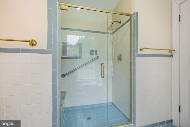 13086 Langley Rd, Bryantown, MD 20617 - bathroom with tile walls and a shower stall