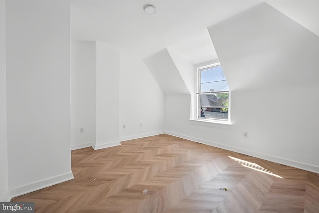 bonus room featuring baseboards