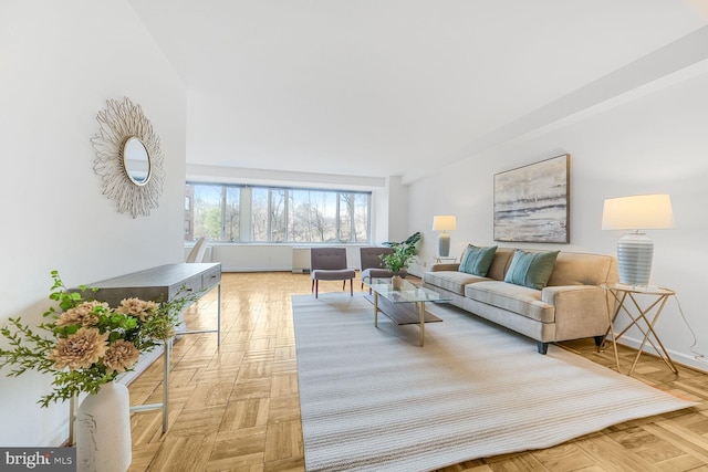 living room featuring baseboards