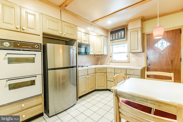 kitchen featuring pendant lighting, light countertops, ornamental molding, light tile patterned flooring, and white appliances