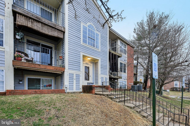 view of property with central AC unit