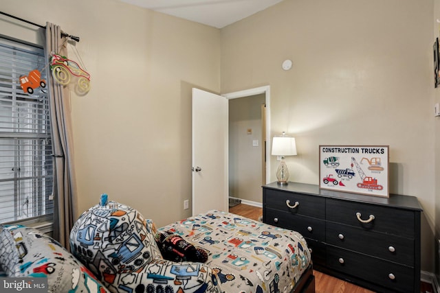 bedroom with light wood-style floors