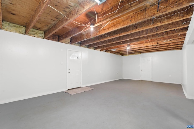 unfinished basement with baseboards