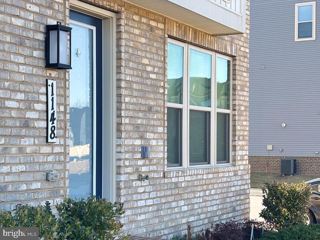 view of home's exterior featuring brick siding