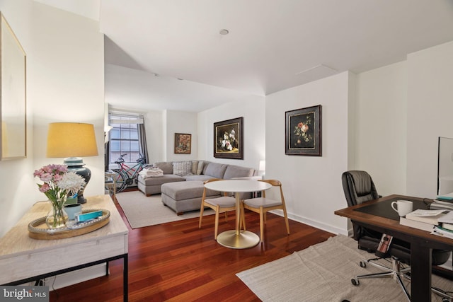 office space featuring wood finished floors and baseboards