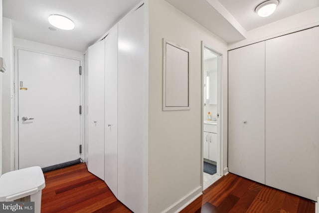 corridor with wood finished floors