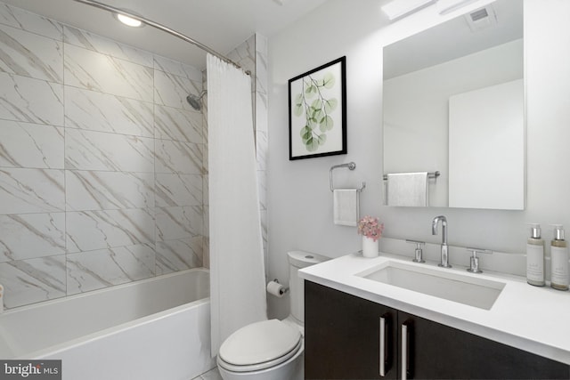 full bathroom featuring toilet, visible vents, shower / bath combo with shower curtain, and vanity