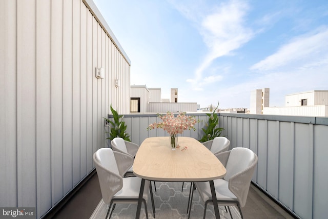 balcony with outdoor dining area