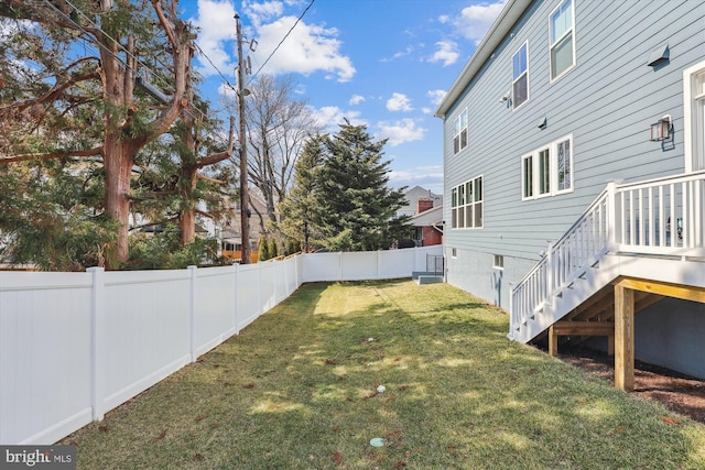 view of yard featuring a fenced backyard