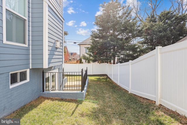 view of yard featuring a fenced backyard